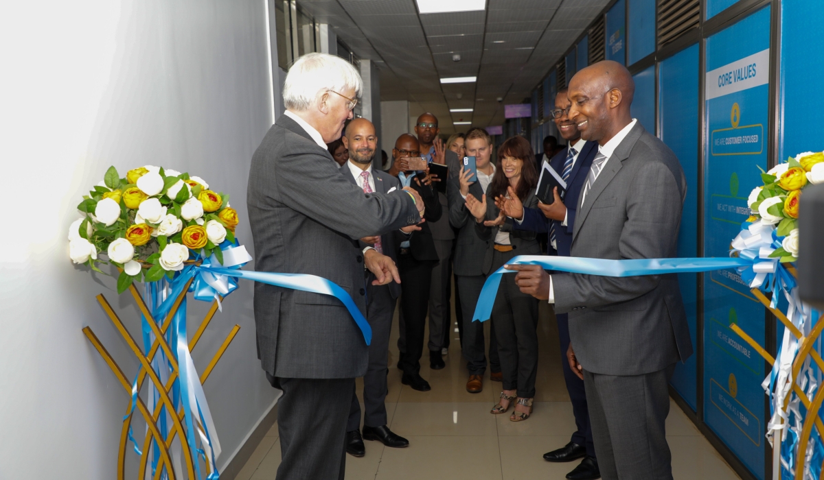 UK Minister of State for Development and Africa, Andrew Mitchell (L) and Rwanda&#039;s Minister of State in charge of National Treasury, Richard Tusabe inaugurating the Office of Exchange of Information for tax purposes.