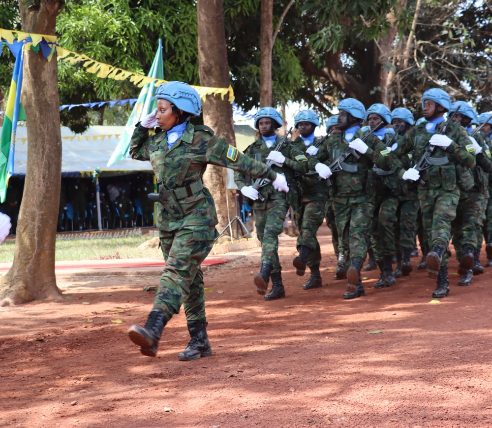 A female RDF soldier leads a military parade during their peacekeeping mission in Central Africa Republic. Only 1,000 female peacekeepers have been deployed since 2004. Courtesy.