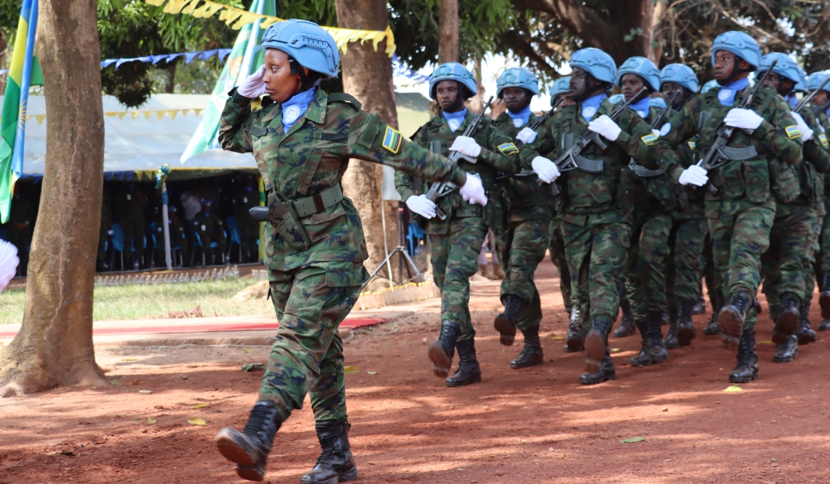 A female RDF soldier leads a military parade during their peacekeeping mission in Central Africa Republic. Only 1,000 female peacekeepers have been deployed since 2004. Courtesy.