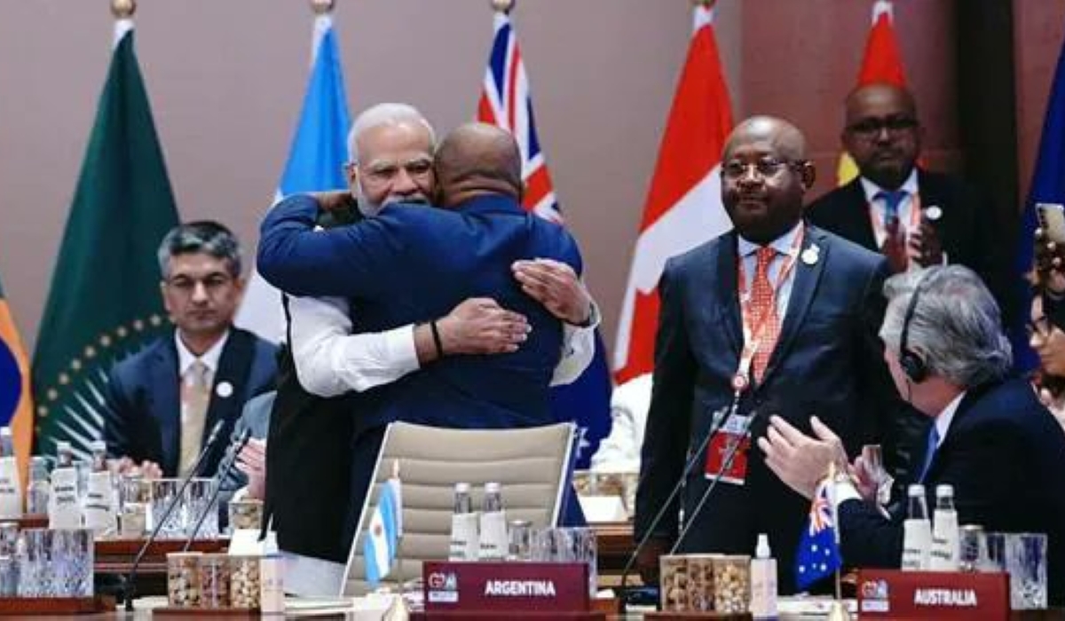 New Delhi: Prime Minister Narendra Modi hugs President of the Union of the Comoros and Chairperson of the African Union (AU) Azali Assoumani as the latter takes his seat after the Union became a permanent member of the G20 during the G20 Summit 2023 at the Bharat Mandapam, in New Delhi, Saturday, Sept. 9, 2023. (PTI Photo)