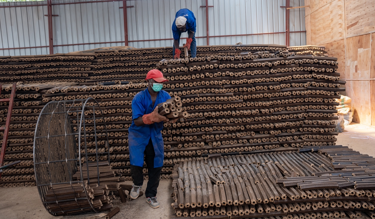 Workers sort some briquettes that are used  as a  clean cooking energy  in Rwanda. Photo by Willy Mucyo