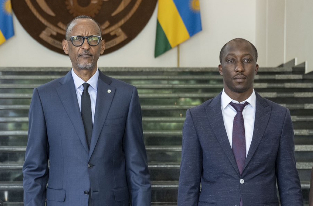 President Paul Kagame and the  newly appointed  Minister of Infrastructure Jimmy Gasore pose for a photo after a swearing-in ceremony on Wednesday, September 13. Photo by Village Urugwiro