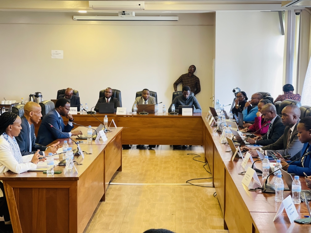 Rwanda FDA Director General, Emile Bienvenu (centre in the left row), makes a point during PAC hearings on September 14, 2023, at Parliamentary Buildings in Kigali (Emmanuel Ntirenganya).