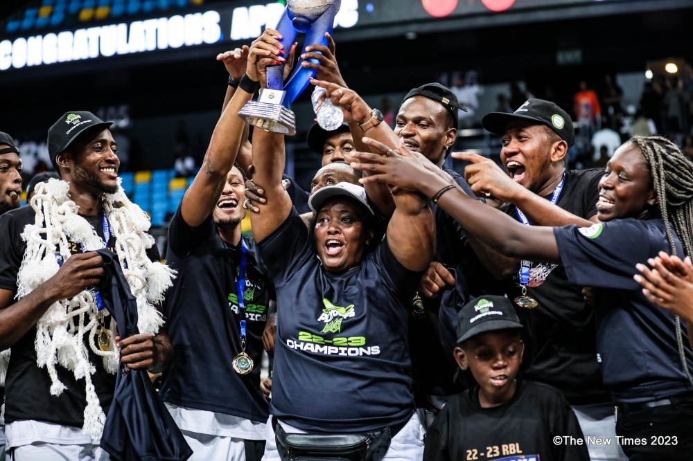 Josie Mpoyo lifts the trophy as she joined APR BBC players to celebrate the title on September 8. Mpoyo&#039;s mother  traveled from Idaho, United States, to support her son Axel Mpoyo, a power forward who helped APR BBC win the 2023 league championship.  All photos by Dan Gatsinzi