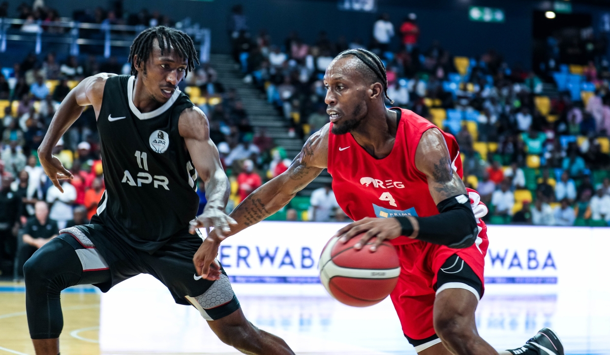 Adonis Filer tries to go past Nshobozwabyosenumukiza.  APR BBC star Jean Jacques Wilson Nshobozwabyosenumukiza will be the captain during All-Stars Game. Photo by Dan Kwizera