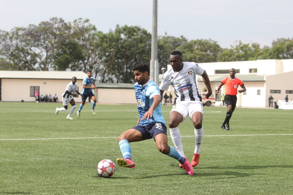 APR FC and Pyramids FC players during a goalless draw during the competition’s second round first leg held at Kigali Pelé Stadium on Sunday. Courtesy