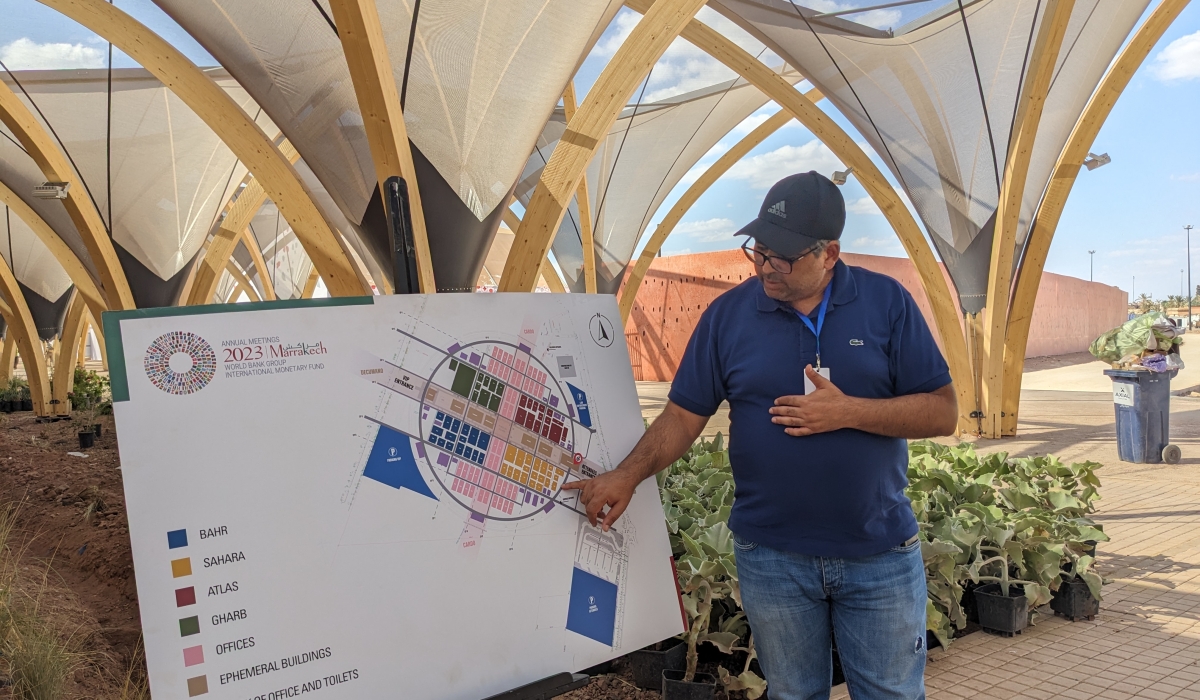 An engineer at the constrcution site of the meetings venue in Marrakech explains the design to the visiting journalists. Photo by Moise M. Bahat