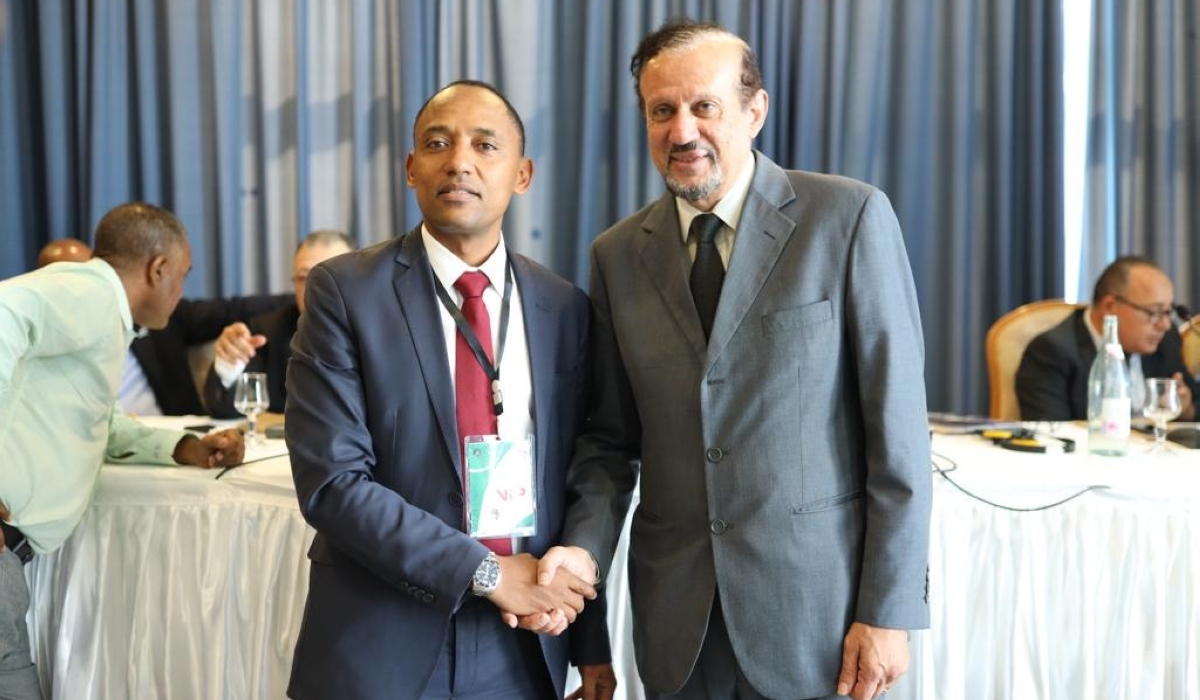 RTTF President John Birungu with ATTF President Khaled El-Salhy at the AGM in Tunis. Courtesy