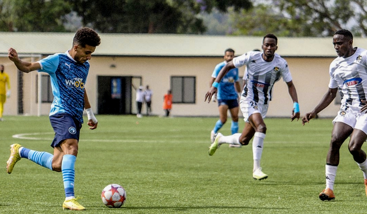 Pyramids FC players with the ball as he tries to go past APR FC defenders during a goalless draw at Kigali Pele Stadium on Sunday, September 17. Courtesy