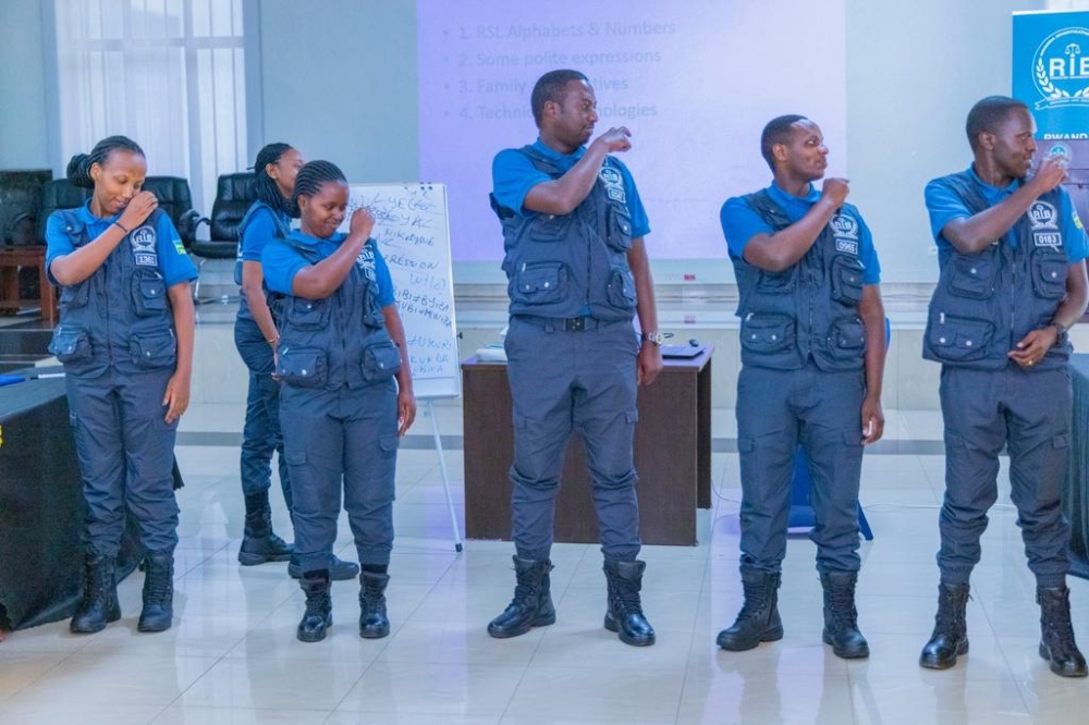 Rwanda Investigation Bureau staff during  a second training session on sign language. Courtesy
