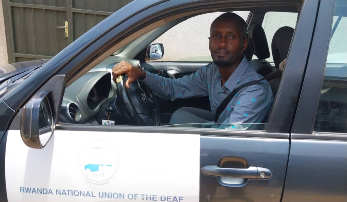 Parfait Rwaka, a Rwandan with speech and hearing impairment, works as a driver for Rwanda National Union of the Deaf but he cannot get a Rwandan driving licence because the law does not allow due to his disability. Courtesy.