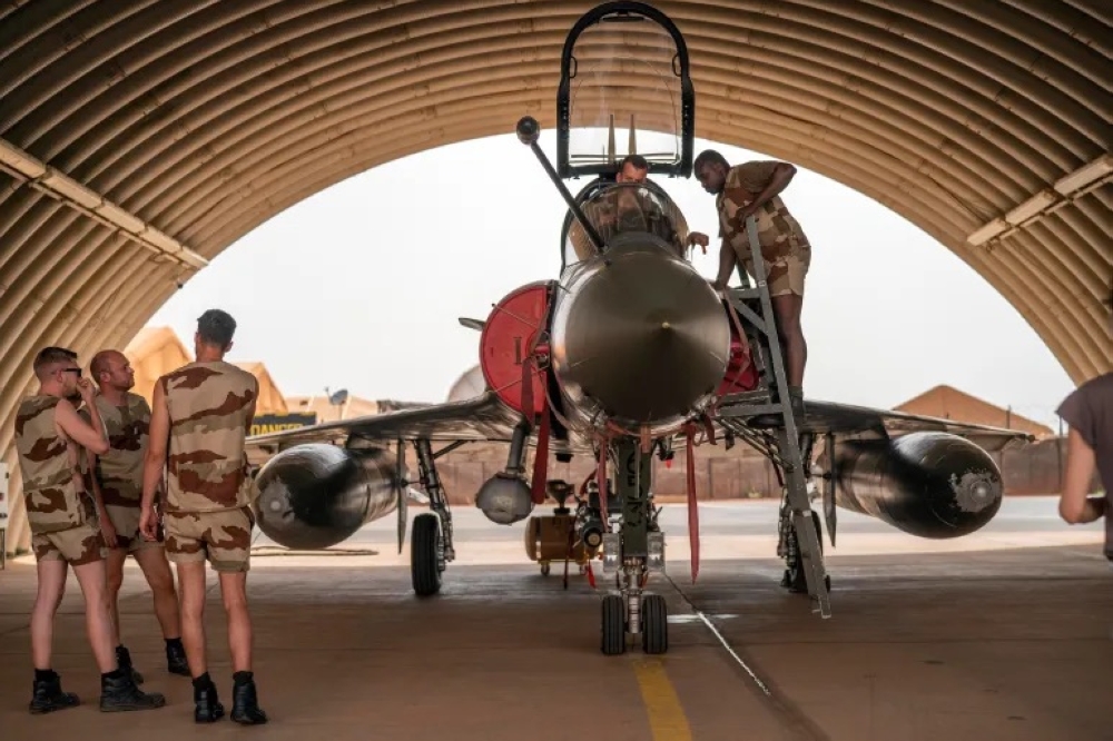 French Barkhane Air Force members at the Niamey, Niger base [File- Jerome Delay-AP Photo]