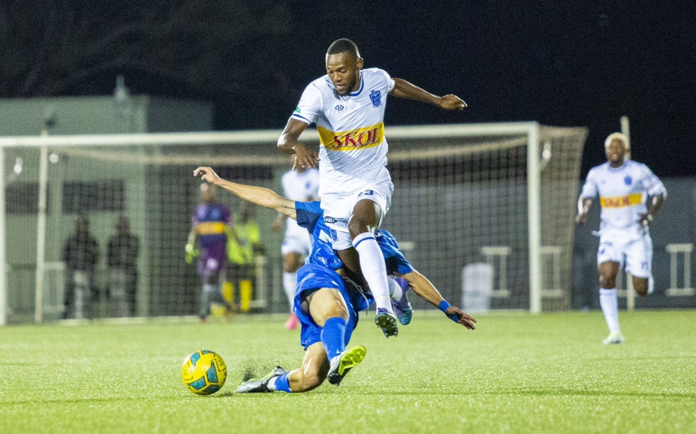 Rayon Sports player  Isaac Mitima wins the ball against Al Hilal Benghazi&#039;s during a 1-1 draw at Kigali Pele Stadium on Sunday, September 24. COURTESY