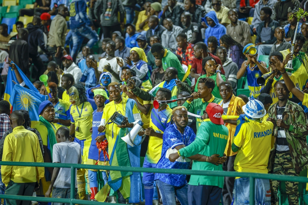 Rwanda national football team fans watch a game between Senegal and Rwanda at Huye Stadium.
