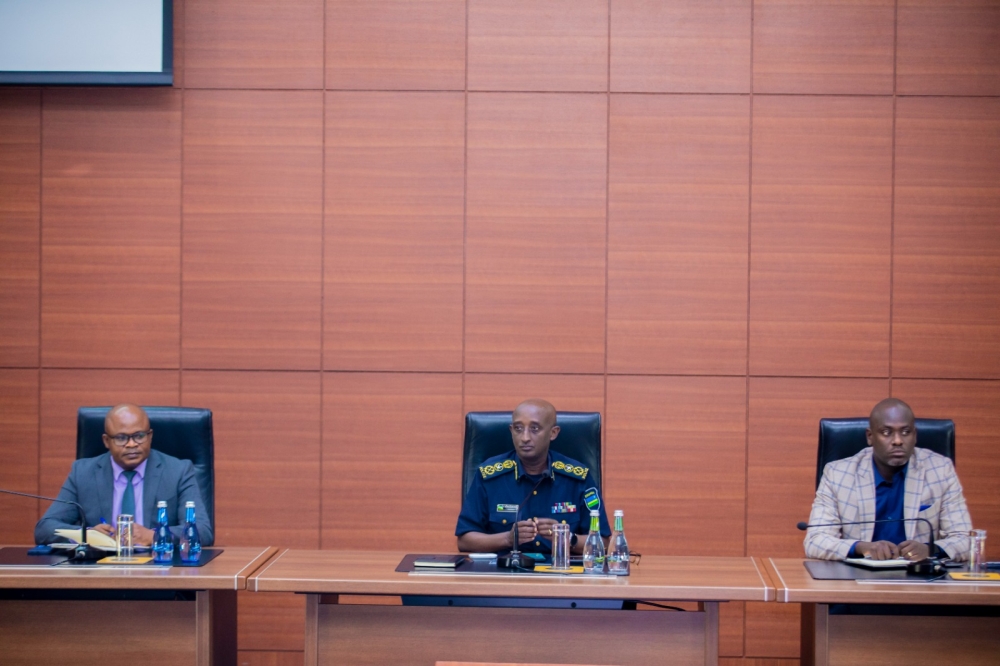 Inspector General of Police (IGP) Felix Namuhoranye chairing a meeting flanked by Chief Executive Officer of REG, Armand Zingiro, and Omar Munyaneza, the Chief Executive Officer of WASAC on Thursday, September 28.