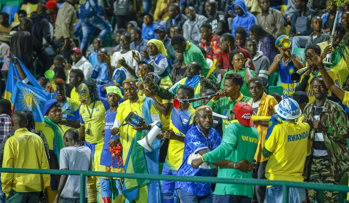 Rwanda national football team fans watch a game between Senegal and Rwanda at Huye Stadium.