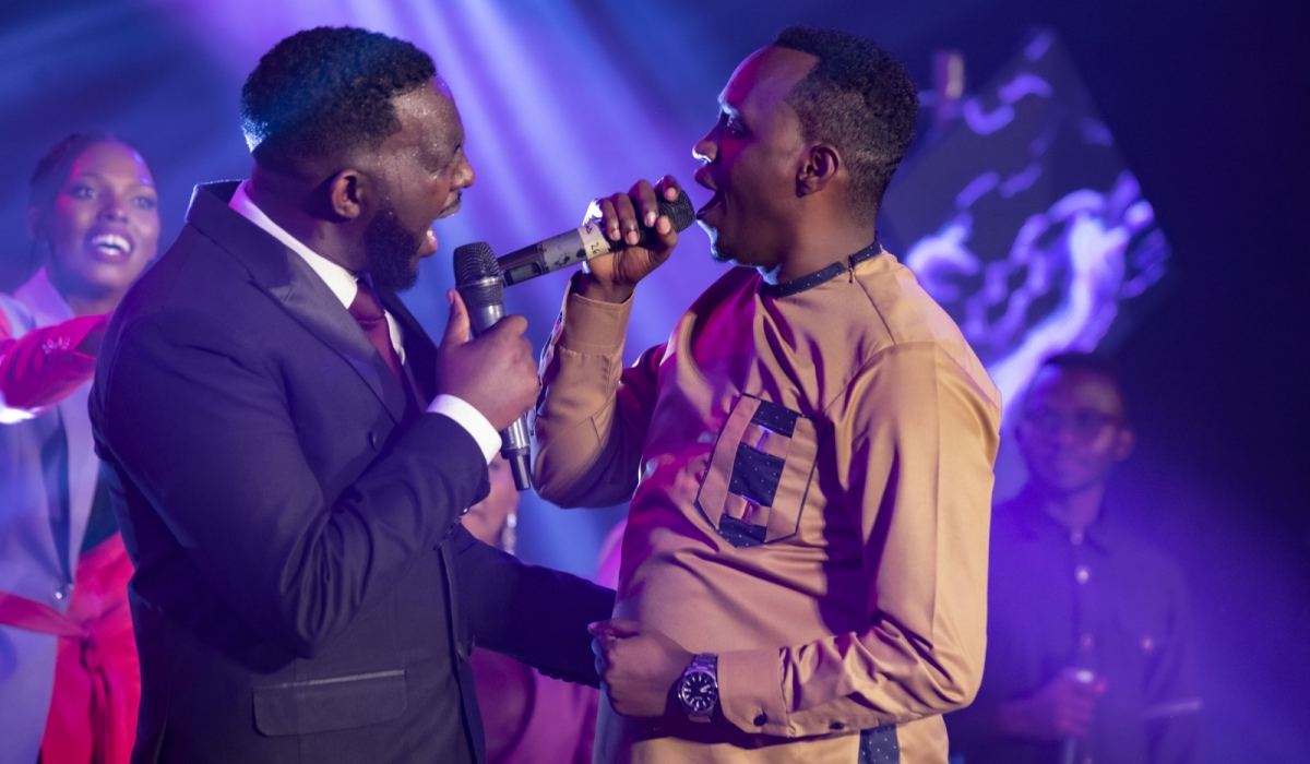 Canada based gospel singer Nice Ndatabaye and "Ibyo Ntunze" songwriter Bosco Nshuti perform at the live concert in Kigali on Friday, September 29. Photos by Emmanuel Dushimimana