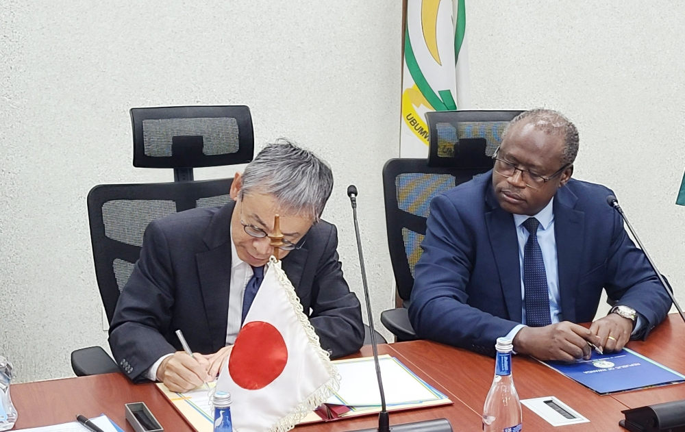 Minister of Finance and Economic Planning, Uzziel Ndagijimana and Ambassador of Japan to Rwanda, Isao Fukushima sign the agreement in Kigali on Thusday,October 5. Courtesy