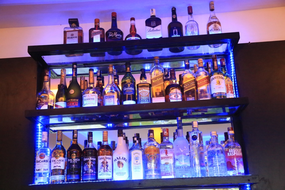 Rwanda National Police has said liquor stores and groceries in Kigali are turning into bars in an unlawful way that will not be overlooked by law enforcement agencies. Photo by Craish BAHIZI