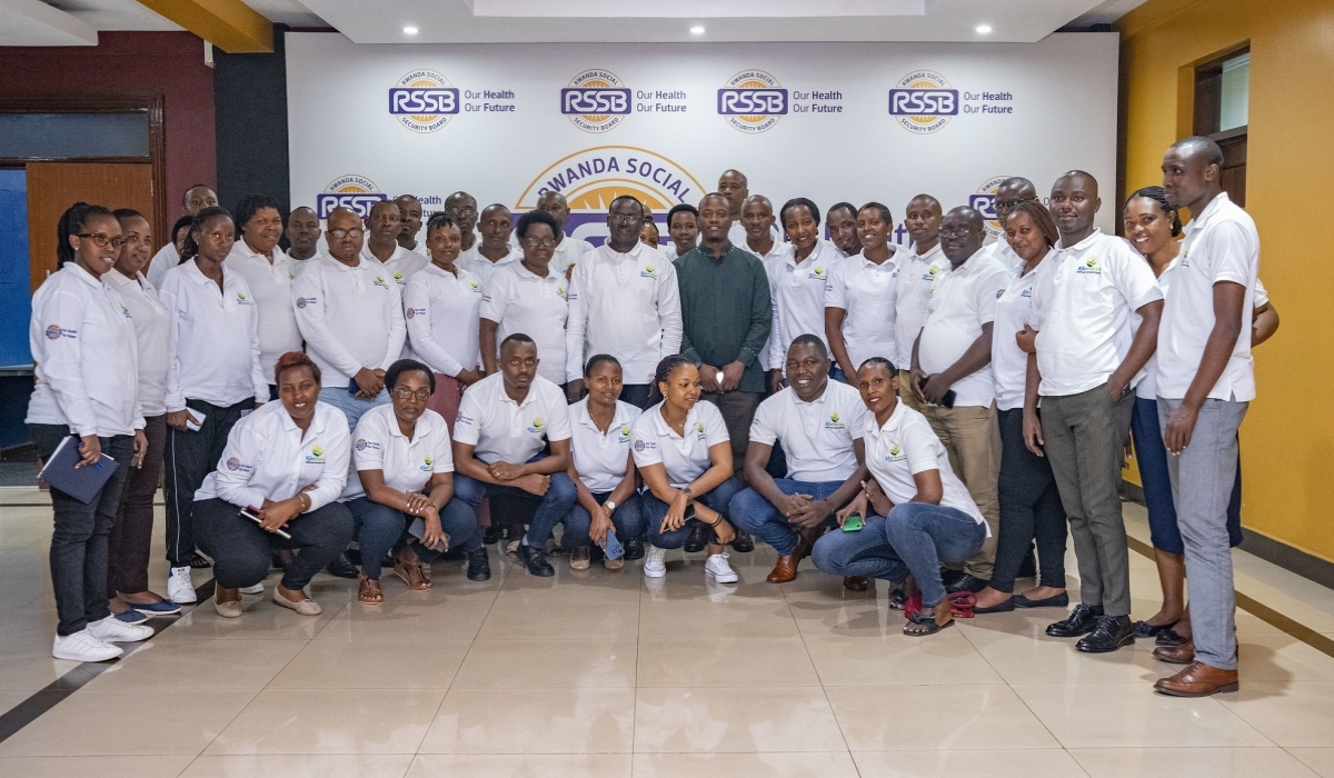RSSB Chief Executive Officer, Regis Rugemanshuro(C) with district coordinators of EjoHeza Long Term Saving Scheme at the annual consultative meeting on August 16. Emmanuel Dushimimana