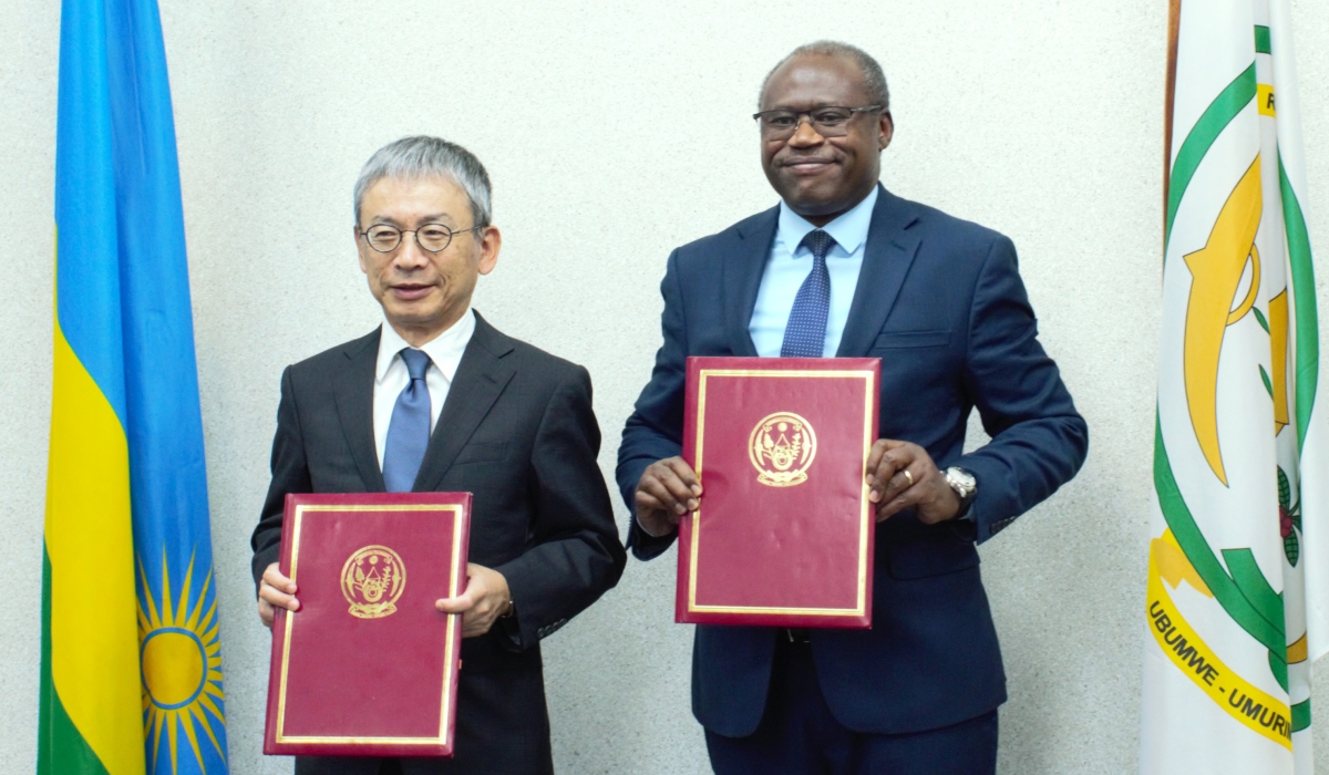 Minister of Finance and Economic Planning, Uzziel Ndagijimana and  Ambassador of Japan to Rwanda, Isao Fukushima during the signing ceremony of the agreement in Kigali on Thusday,October 5. Courtesy