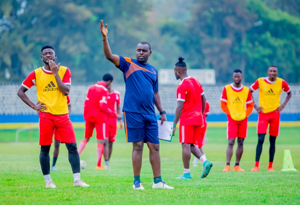 Musanze FC head coach Sostene Habimana gives instructions to his  players during a training session in Musanze. Photo by Christophe Renzaho