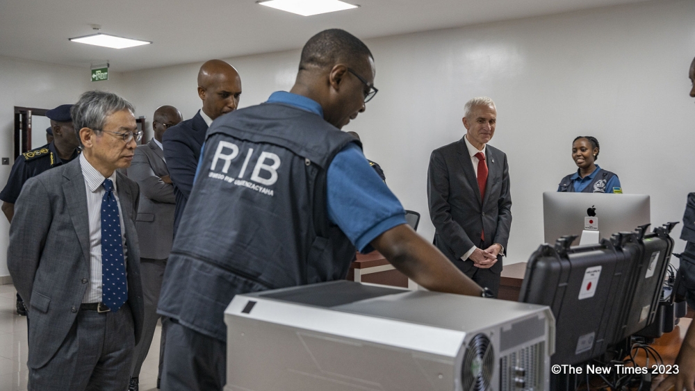 (L-R)  Isao Fukushima, the Ambassador of Japan in Rwanda, Minister of Justice Emmanuel Ugirashebuja (c) and Interpol’s Secretary General Jürgen Stock and with other officials during a guided tour of the newly inaugurated Regional Cybercrime Investigation Centre for Excellence on Friday, October 6. Photos by Emmanuel Dushimimana