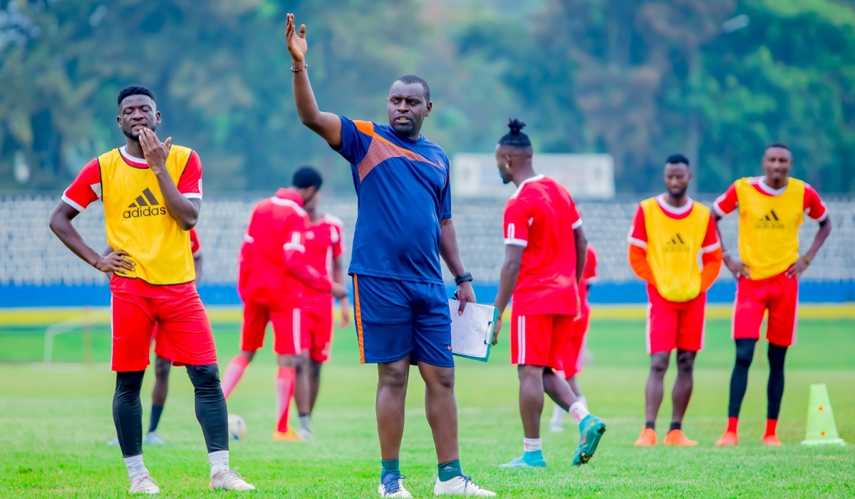 Musanze FC head coach Sostene Habimana gives instructions to his  players during a training session in Musanze. Photo by Christophe Renzaho