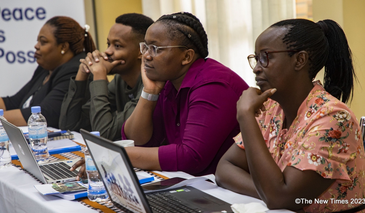 Participants follow a presentation during the session on the newly designed curriculum that has been created to promote positive masculinity and positive parenting in the country. All photos by Emmanuel Dushimimana