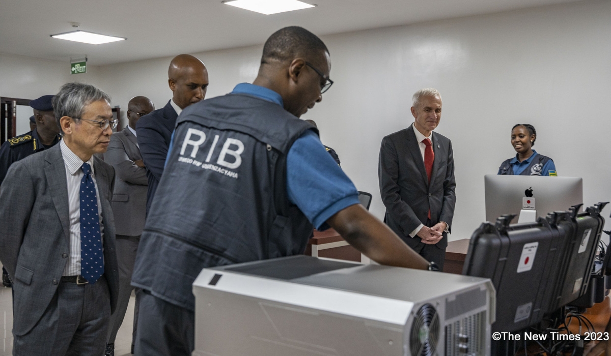 (L-R)  Isao Fukushima, the Ambassador of Japan in Rwanda, Minister of Justice Emmanuel Ugirashebuja (c) and Interpol’s Secretary General Jürgen Stock and with other officials during a guided tour of the newly inaugurated Regional Cybercrime Investigation Centre for Excellence on Friday, October 6. Photos by Emmanuel Dushimimana