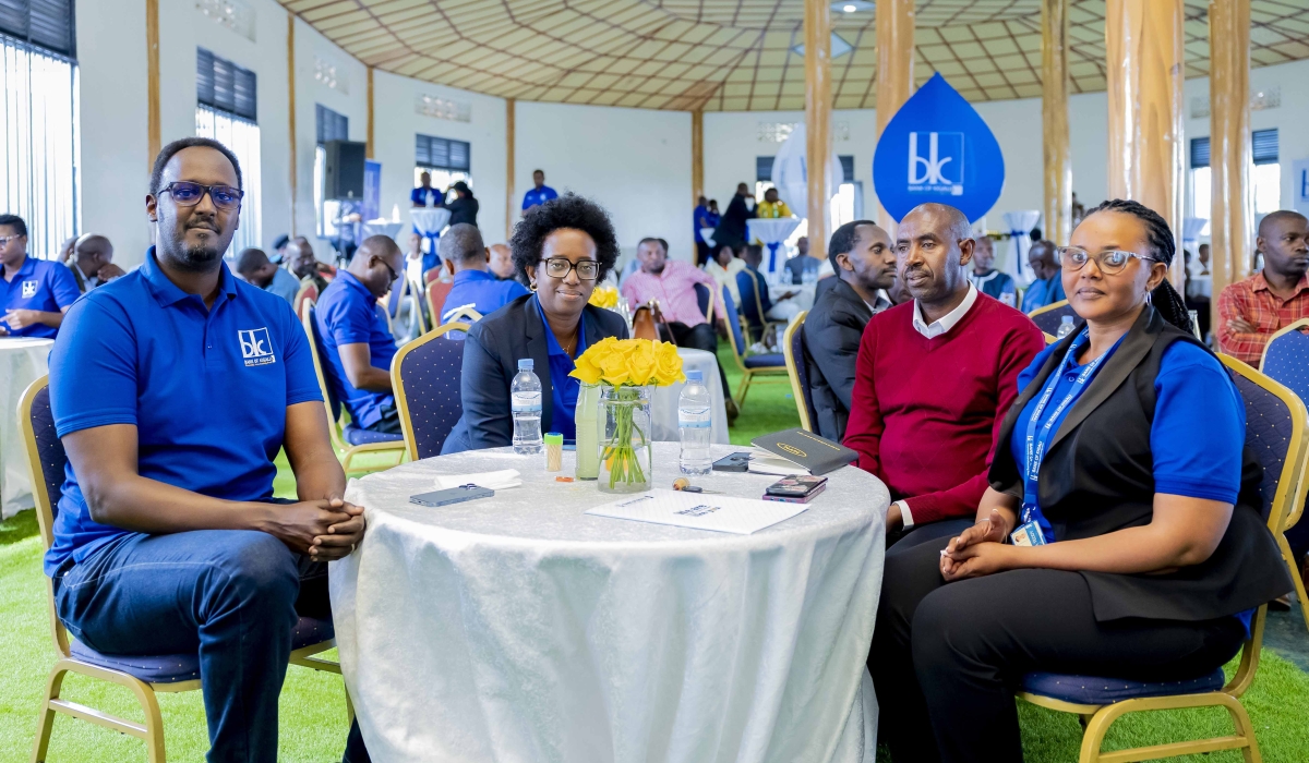 Bank of Kigali (BK)  CEO Dianne Karusisi  with other staff meet with the bank&#039;s clients during the event to conclude the  annual customer service week in Gicumbi District on Friday, October 6. Courtesy