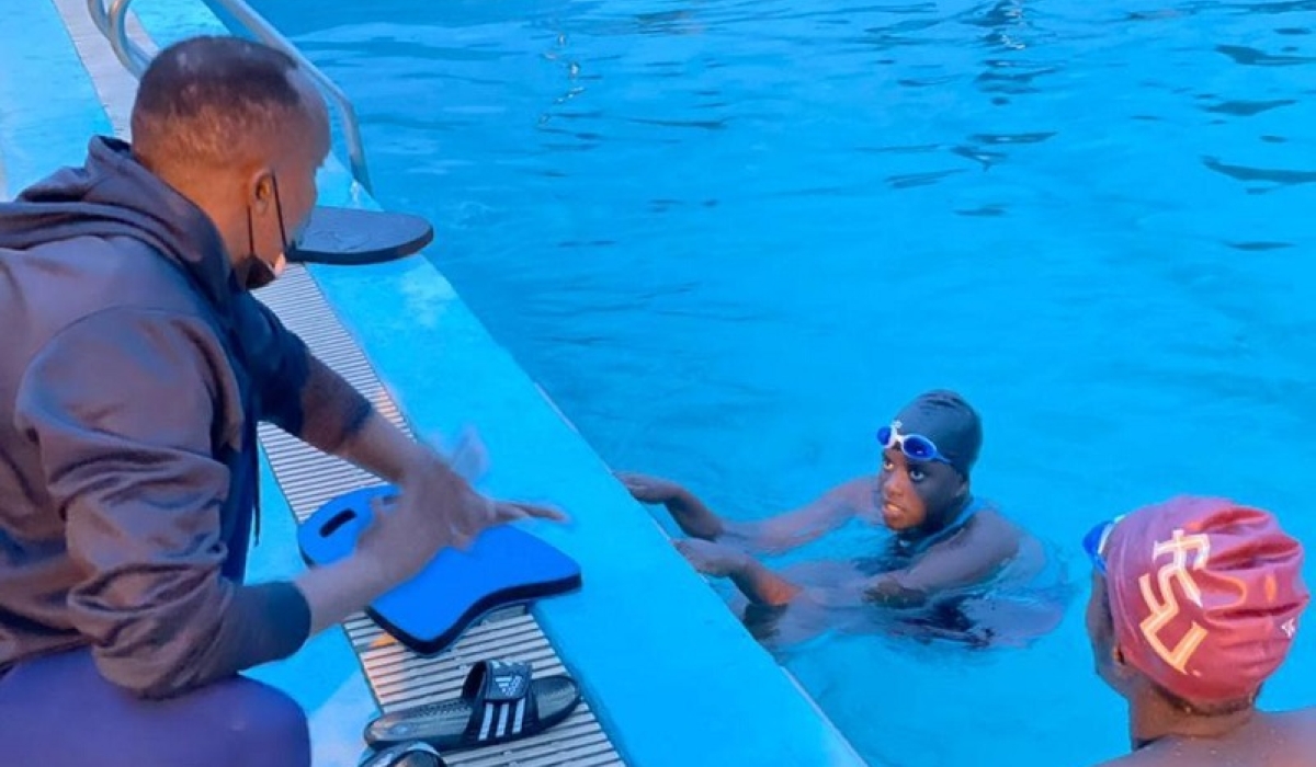 Claudette Ishimwe is briefed by her coach during a training session. At least 30 swimmers were selected to represent Rwanda at the 2023 Africa Aquatics Zone 3 III championship due in Kigali from November 21-27. File