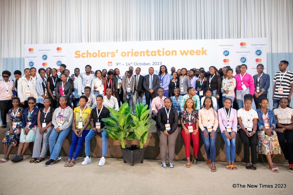 Officials and scholars pose for a group photo during the event that  aimed to equip scholars with the necessary knowledge, skills and key information to succeed and transition into the workplace,  at Camp Kigali on October 9. Photos by Craish Bahizi