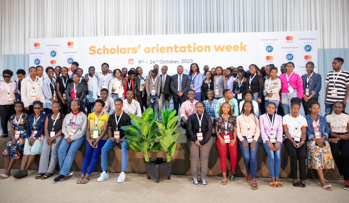 Officials and scholars pose for a group photo during the event that  aimed to equip scholars with the necessary knowledge, skills and key information to succeed and transition into the workplace,  at Camp Kigali on October 9. Photos by Craish Bahizi