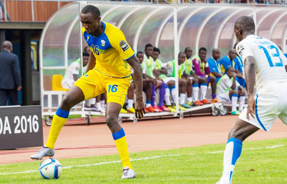 Amavubi striker Ernest Sugira with the ball during the game. Sam Ngendahimana