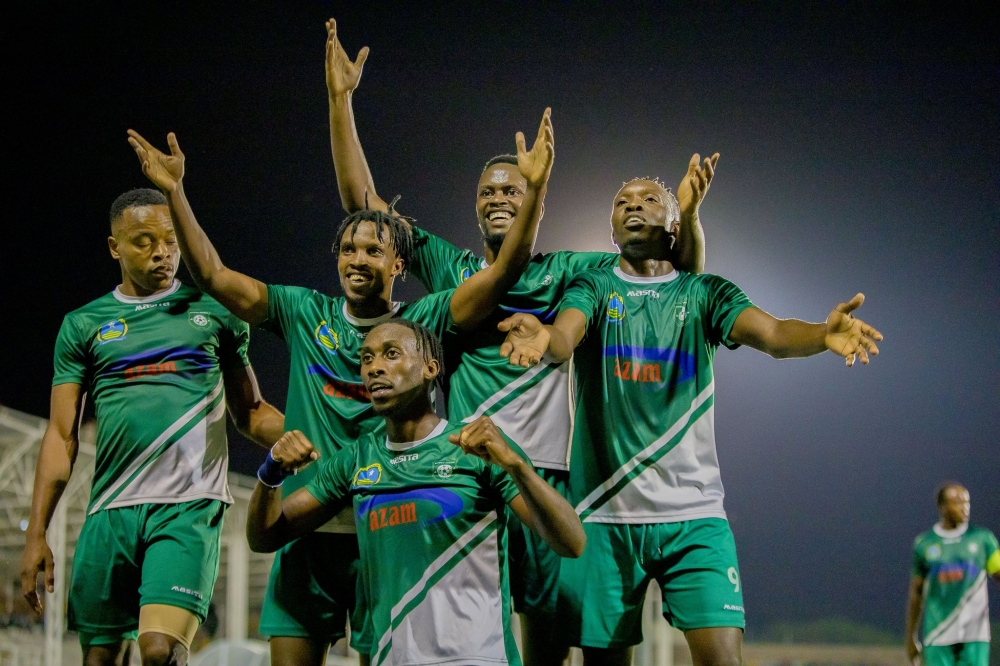 SC Kiyovu players cheer on supporters as they celebrate a 2-1 victory against Marine Fc on Saturday evening at Kigali Pelé Stadium. Courtesy
