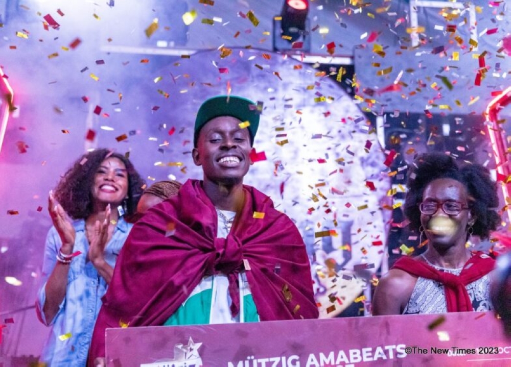 The winner DJ Kavori emerged as the victor in the "Mützig Amabeats DJ Competition," defeating his fellow competitors in a finale showdown that took place at Kigali Conference and Exhibition Village (KCEV) on the evening of Saturday, October 14. Photos by Dan Gatsinzi