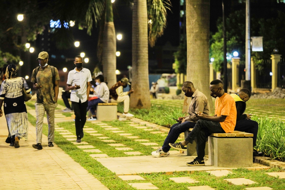 Citizens walk others sit on new benches at Imbuga City walk . The City of Kigali will host the 23rd International Walk21 Conference on walking and liveable communities from October 16 to 20. File