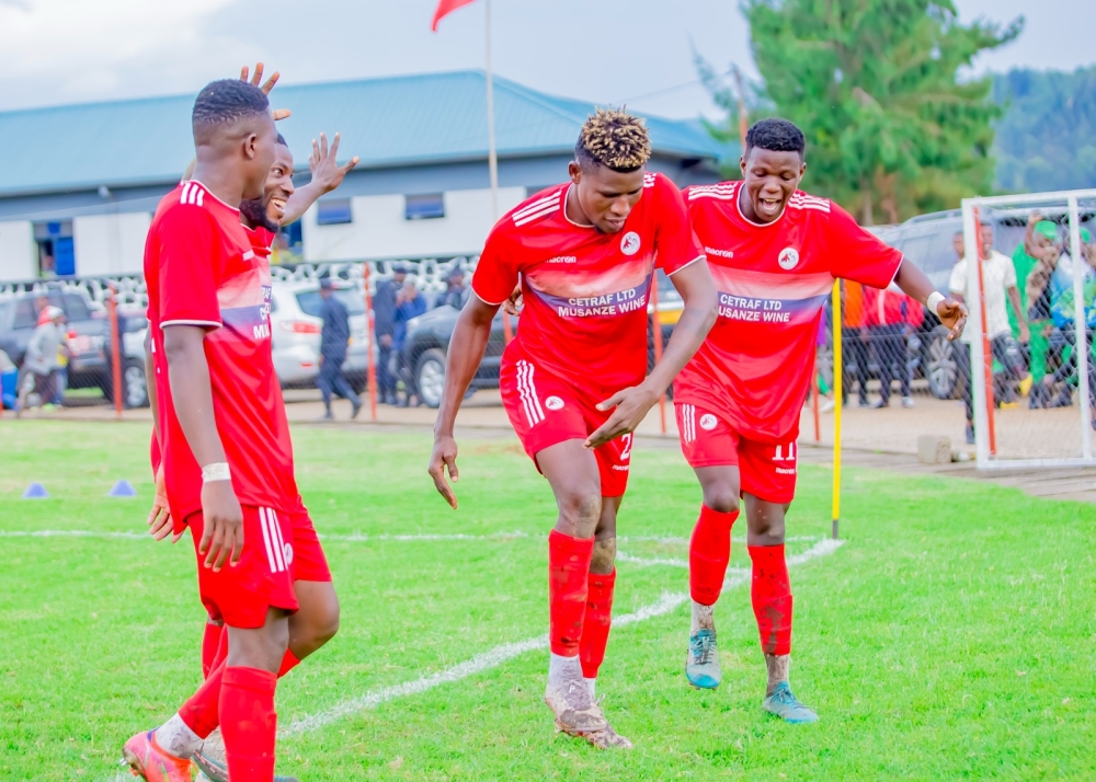 Musanze FC&#039;s Peter Agblevor (c) with teammates celebrate his 51st minute strike as Musanze FC beat Rayon Sports 1-0 in a crunch tie held at Ubworoherane Stadium on Sunday. Photos by Christophe Renzaho
