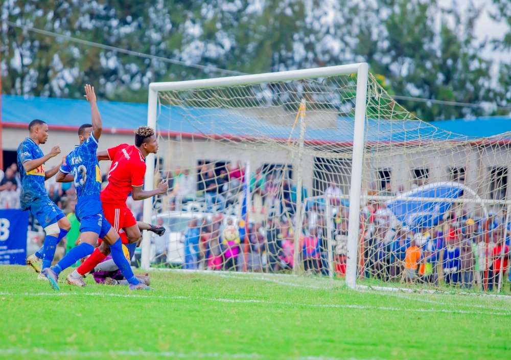 Musanze Fc striker Peter Agblevor scores his goal when Musanze FC  shock Rayon Sports 1-0 in a crunch tie  at Ubworoherane Stadium on Sunday.  Photos by Christophe Renzaho