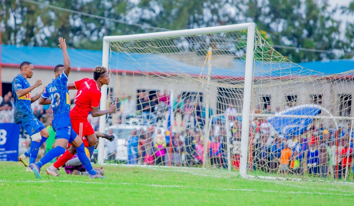 Musanze Fc striker Peter Agblevor scores his goal when Musanze FC  shock Rayon Sports 1-0 in a crunch tie  at Ubworoherane Stadium on Sunday.  Photos by Christophe Renzaho