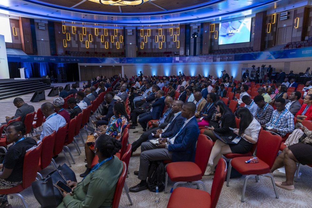 Experts follow a presentation on the potential of 5G technology in Africa at the Mobile World Congress (MWC Kigali) on Tuesday, October 17,