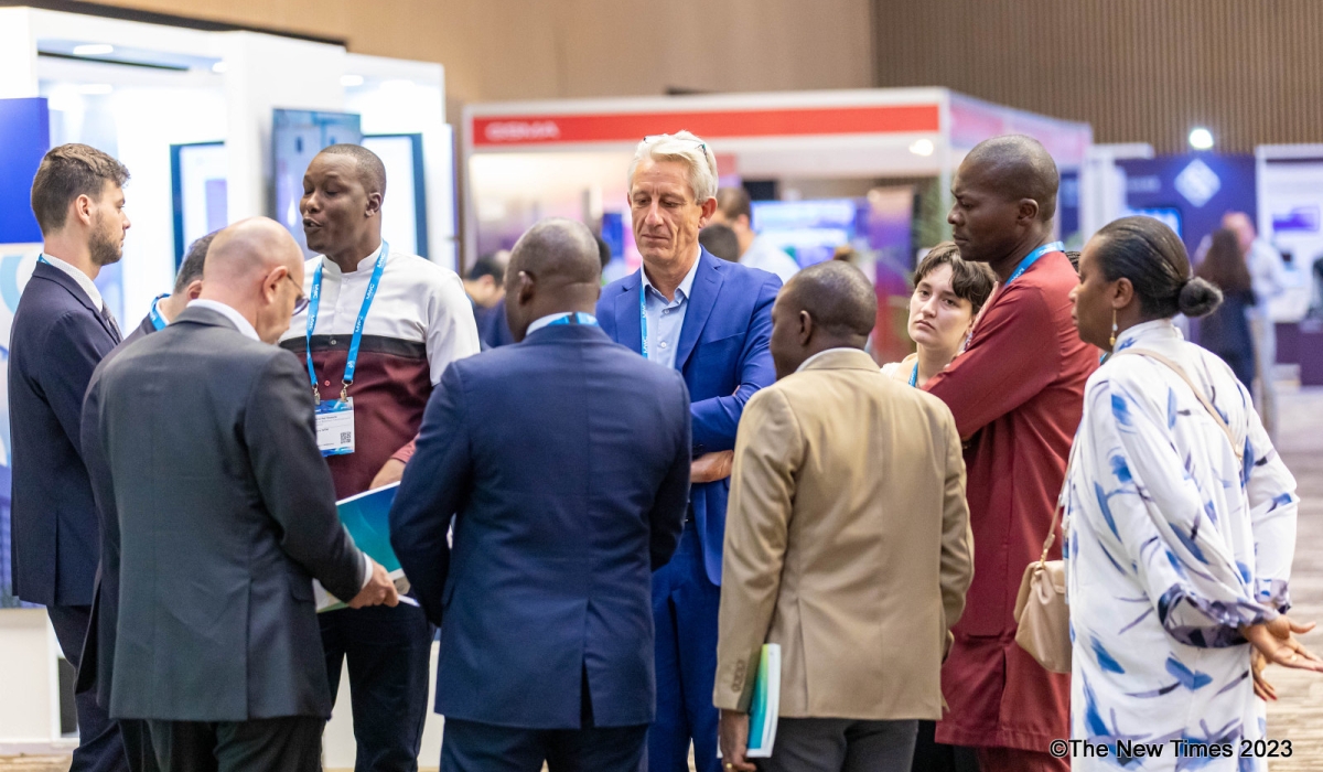 Delegates interact after a side event of Mobile World Congress Kigali on October 18. Photo by Dan Gatsinzi