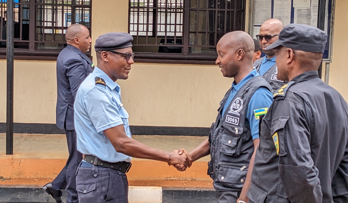 Rwandan officials (Right) meet their Burundian counterparts at the border for the transfer that did not happen.