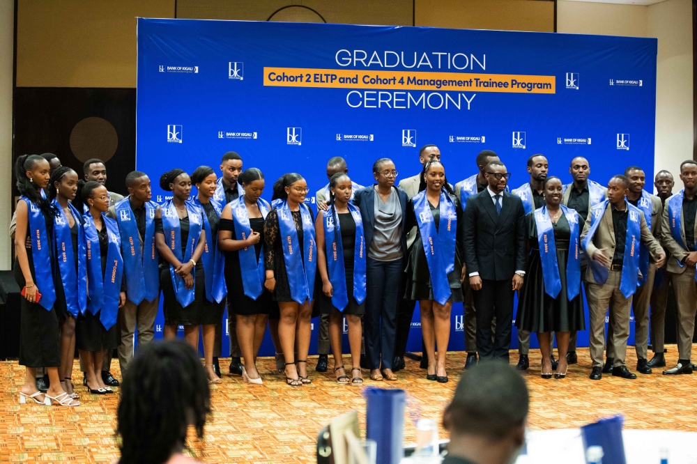 Bank of Kigali CEO Diane Karusisi poses for a group photo with the cohort of 24 at the graduation ceremony. Photos by  Craish Bahizi