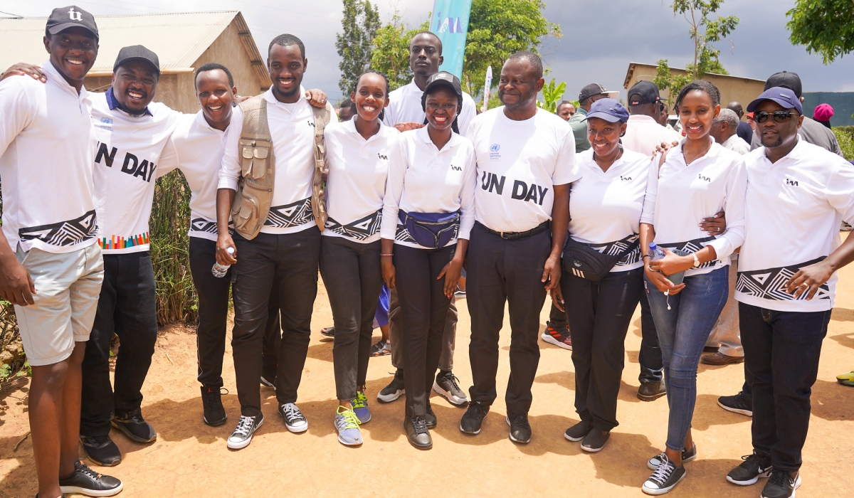 I&M Bank staff with UN coordinator pose for a group photo at the Umuganda tree-planting event to commemorate this year’s United Nations Day in Bugesera  on October 21. Photos by Ctraish Bahizi