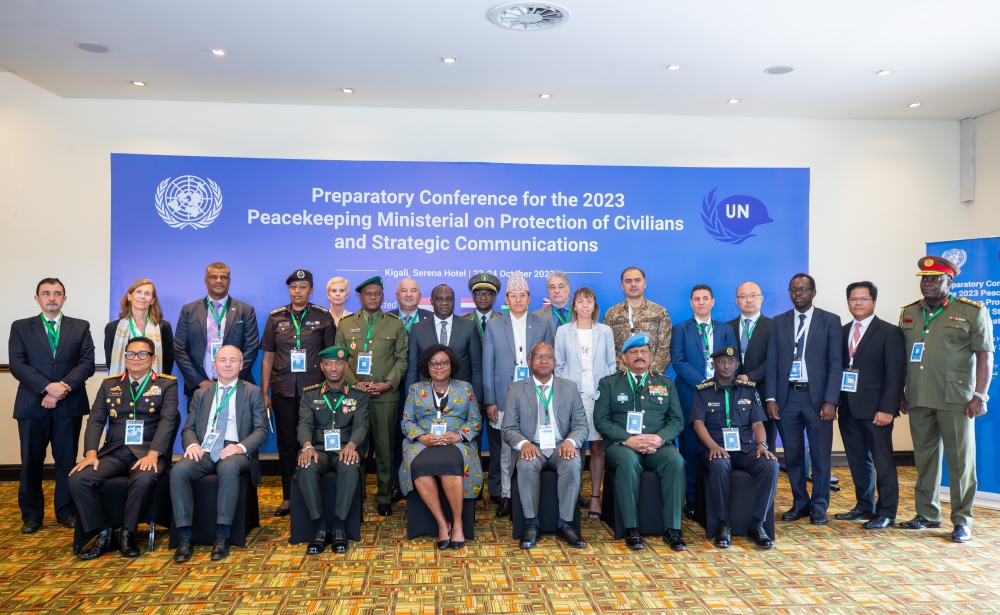 Officials and delegates pose for a group photo at the United Nations preparatory conference in Kigali on Monday, October 23.
