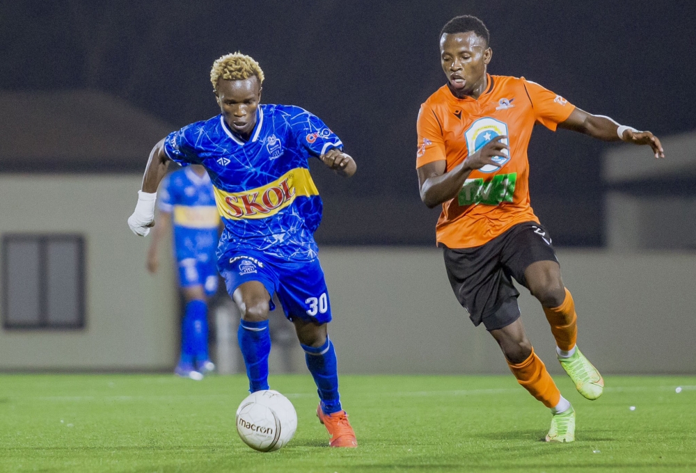 Rayon Sports star forward Joackiam Ojera with the ball against Gasogi&#039;s defender. Ojera  will feature in the squad to play a derby with bitter rivals APR at Kigali Pele Stadium. Courtesy