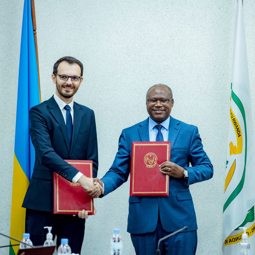 Uzziel Ndagijimana, Minister of Finance and Economic Planning and Marek Tomczuk, member of the management board, BGK, during the signing ceremony in Kigali on October 26. Courtesy