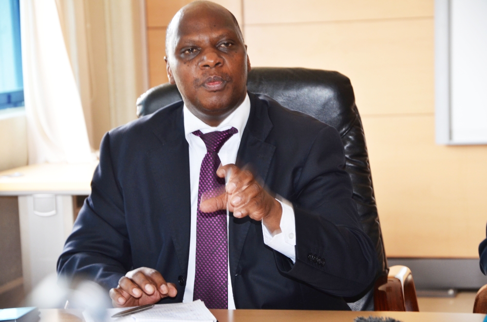 The National Electoral Commission Executive Secretary Charles Munyaneza addresses the media during a past news briefing. FILE